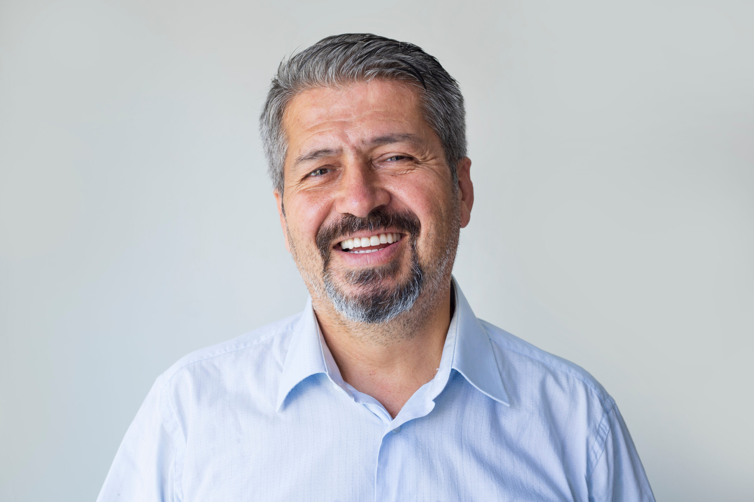 smiling elderly man wearing dentures